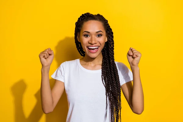 Photo Delighted Overjoyed Person Raise Fists Triumph Accomplishment Isolated Yellow — Stockfoto