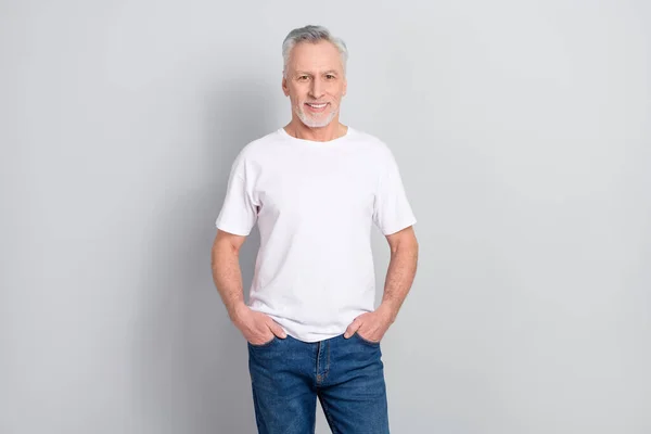 Portrait Attractive Cheerful Grey Haired Man Holding Hands Pockets Isolated — Stockfoto