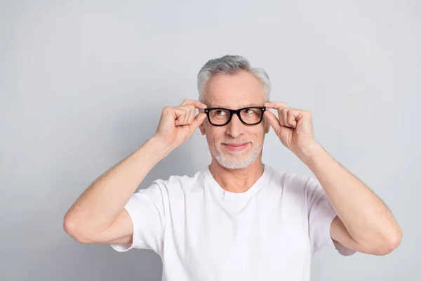 Photo Handsome Positive Person Arms Touch Glasses Look Empty Space — Stock Photo, Image