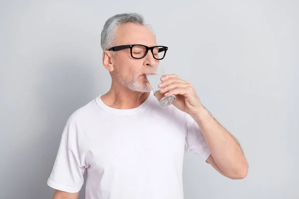 Photo Aged Person Closed Eyes Hold Drink Fresh Water Isolated — Stok fotoğraf