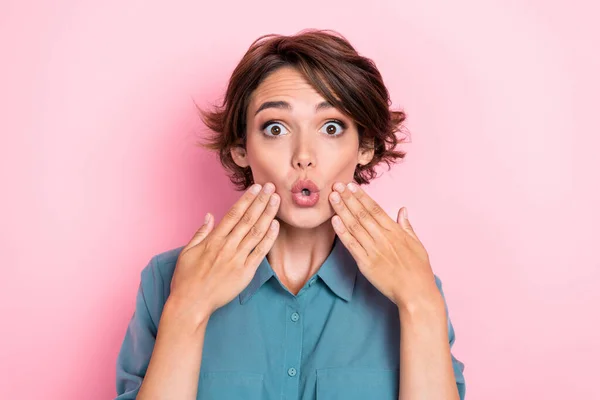 Portrait of astonished shocked person arms near pouted lips cant believe isolated on pink color background.