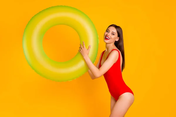Photo Cheerful Funny Lady Dressed Bodysuit Catching Inflatable Circle Isolated — Fotografia de Stock