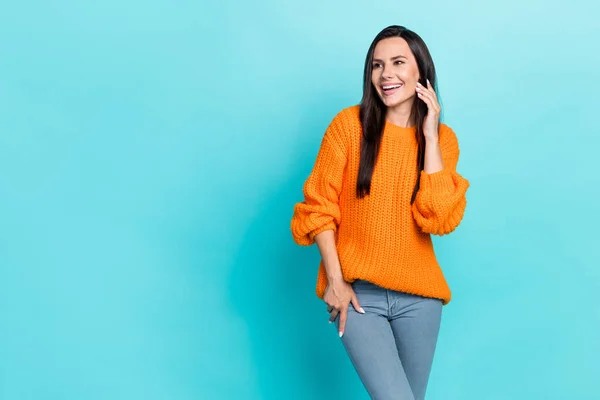 Photo of adorable excited person toothy smile look interested empty space isolated on turquoise color background.