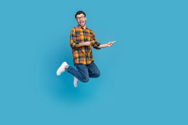 Full Body Portrait Excited Cheerful Man Jump Indicate Fingers Empty — Stock Photo, Image