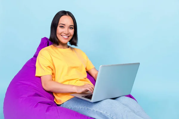 Portrait Cheerful Positive Sweet Girl Yellow Shirt Sit Purple Pouf — Stok Foto