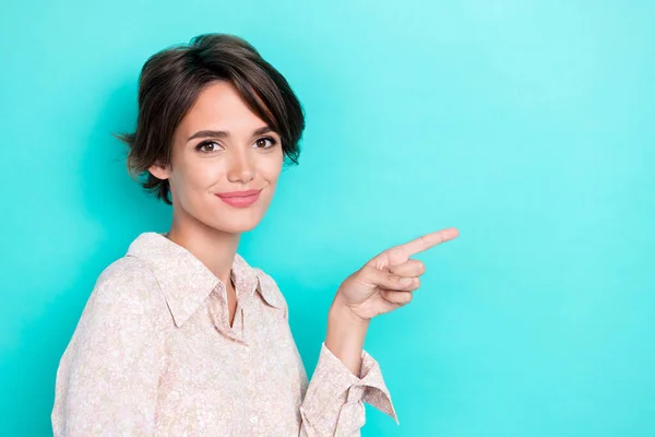 Photo of cute bob hairdo young lady indicate promo wear white shirt isolated on teal color background.