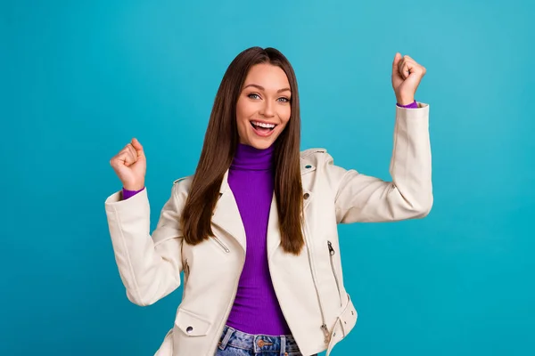 Portrait of overjoyed satisfied person lady raise arm scream yeah rejoice sale shopping store opening isolated on blue color background.