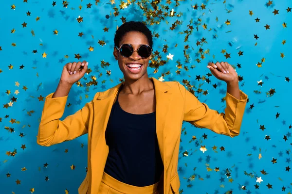 Portrait of excited satisfied person have fun disco chill star air fly isolated on blue color background.