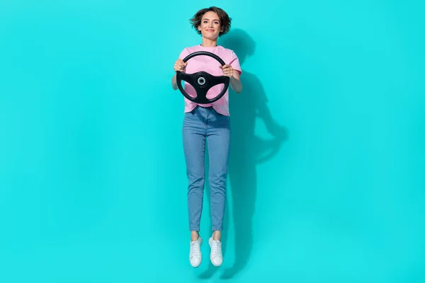 Photo of charming funky lady stylish outfit jump rejoice buy new car first lesson courses repair service isolated on cyan color background.