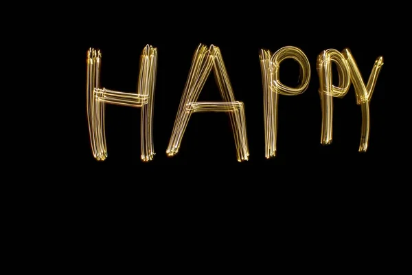 Λέξη Χαρούμενος Γράφεται Μαύρο Φόντο Κίτρινο Φως Μεγάλης Έκθεσης Ευτυχισμένο — Φωτογραφία Αρχείου