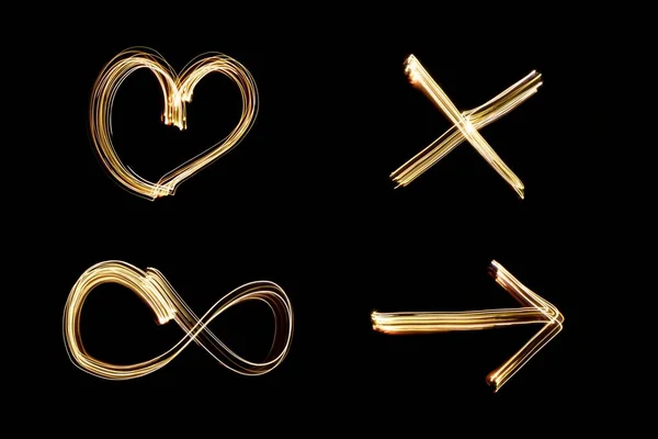 Легкая Живопись Нарисованная Сердце Стрелка Буква Знак Бесконечности Набор Золотых — стоковое фото