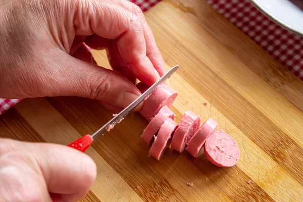 Close Woman Hand Slices Sausage Woman Preparing Cook Sausages Breakfast — Stock Photo, Image