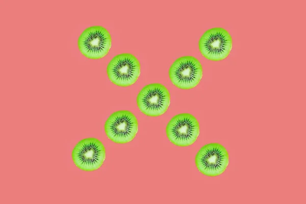Letter Made Kiwi Slices Top View Kiwi Slices Isolated Pink — ストック写真