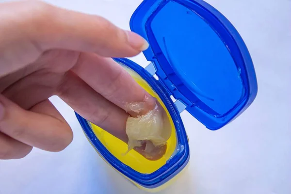 Woman Using Petroleum Jelly Skin Care Top View Closeup — Stock Photo, Image