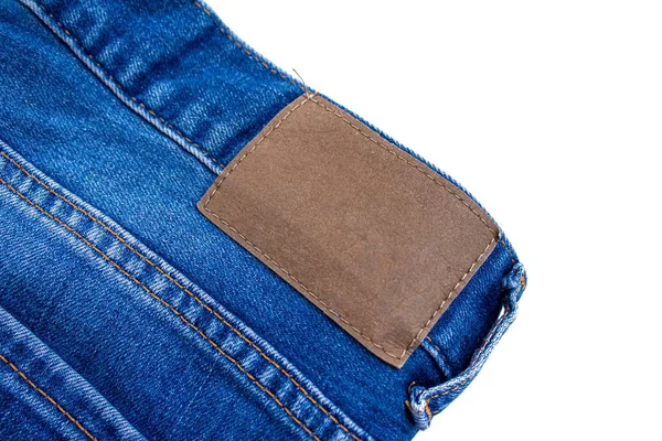 Nahaufnahme Blaue Jeans Mit Leerem Etikett Isoliert Auf Weißem Hintergrund — Stockfoto