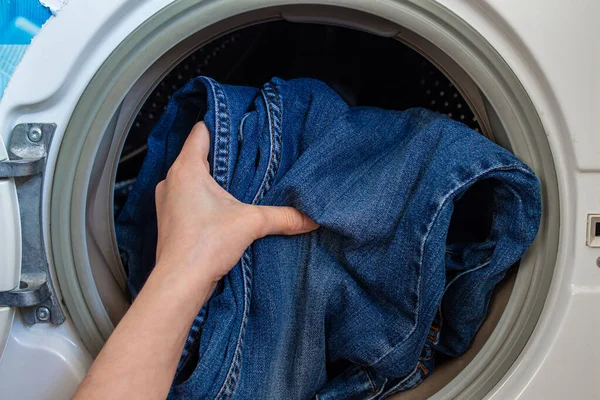 Woman Loads Washing Machine Dirty Clothes — Stock Photo, Image