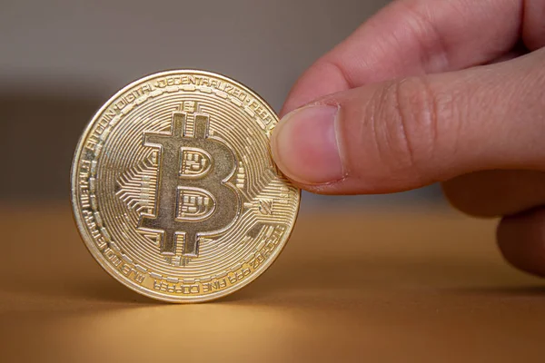 Hand Holding Virtual Currency Bitcoin Closeup Photo Golden Bitcoin — Stock fotografie