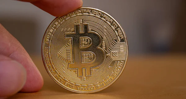 Hand Holding Virtual Currency Bitcoin Closeup Photo Golden Bitcoin — Stock Fotó