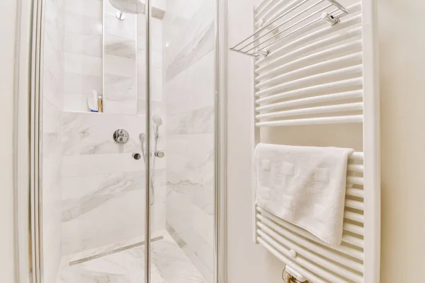 Bright shower cubicle with a radiator — Stock Photo, Image