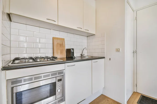 Delightful small kitchen area with microwave