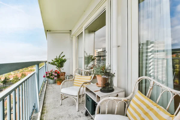 Balcony design with comfortable armchair — Fotografia de Stock