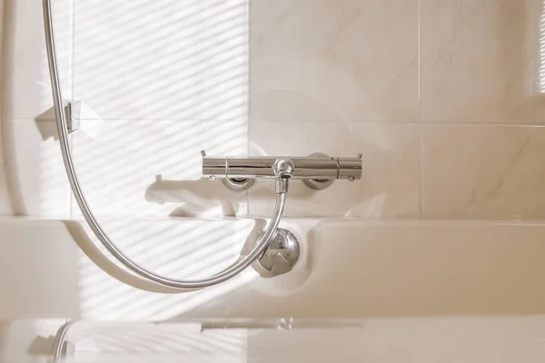 Cozy bathtub with modern faucet — Foto de Stock