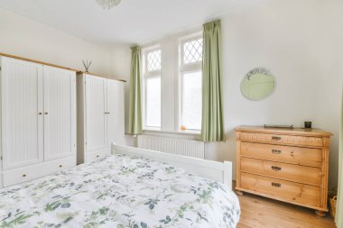 Amazing bedroom with a double soft bed