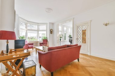 Lovely living room with large windows