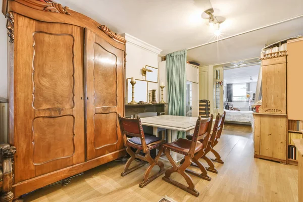 Nice dining area with a wooden table — Stok fotoğraf