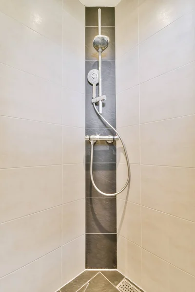 Delightful shower room with modern faucet — Photo