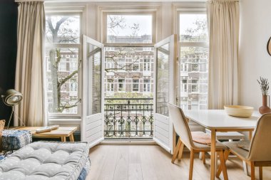 An adorable room with an open door