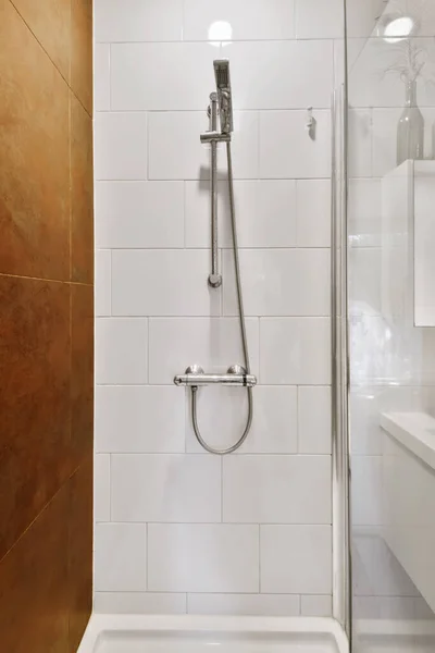 Spectacular shower stall with brown tiled wall — Stock Photo, Image