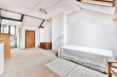 Tek yataklı harika bir yatak odası.