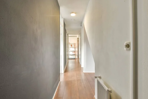 A long straight corridor in gray tones —  Fotos de Stock