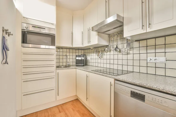 A modest small minimalistic kitchen — 스톡 사진