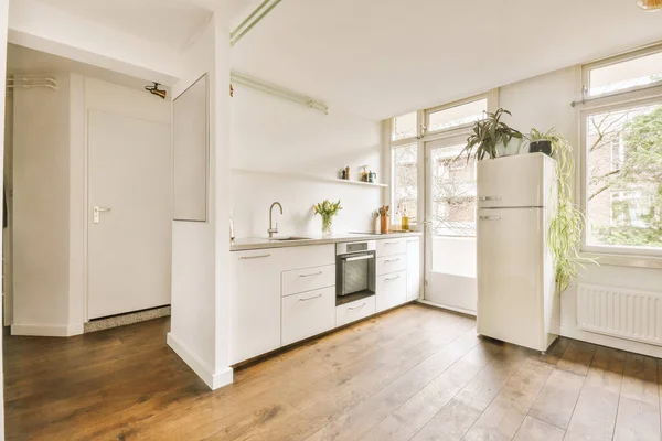 Light kitchen with balcony door — ストック写真