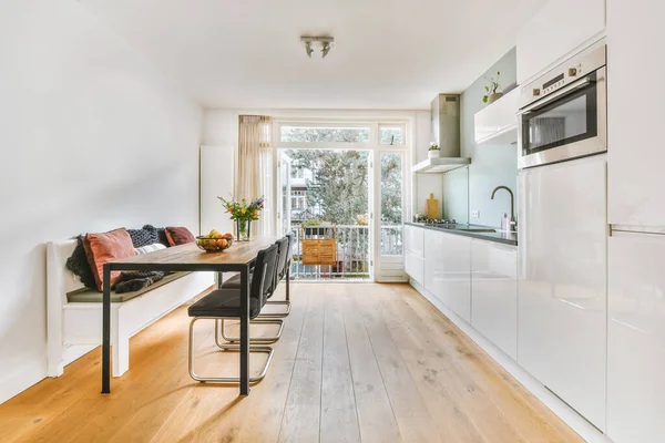 Dining area interior with access to the balcony — Fotografia de Stock