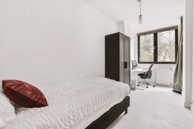 The interior of a modern bedroom in a minimalist style
