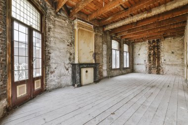 An empty room in need of renovation