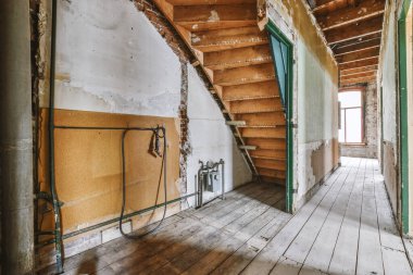 An empty room in need of renovation
