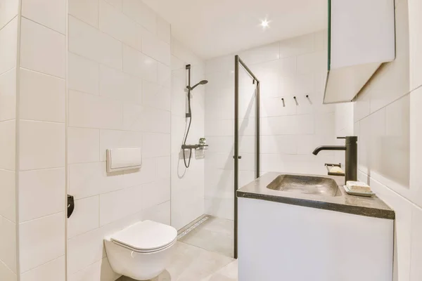 Sinks and toilet near shower cabin — Stok fotoğraf