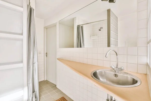 Bathroom interior surrounded by tiles — Stok fotoğraf