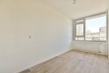 Penceresi ve radyatörü olan boş oda