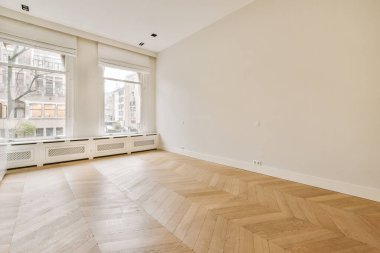 Penceresi ve radyatörü olan boş oda