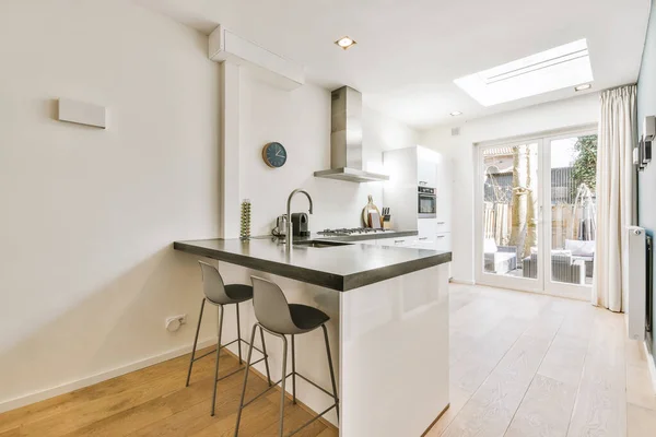 Light kitchen with contemporary furniture