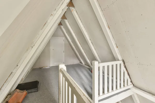 Spacious bright attic room for sports activities and relaxation with a beautiful view from the window