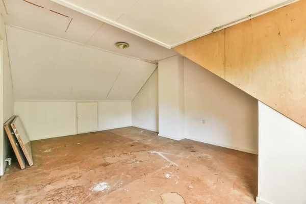 Interior of spacious apartment room on attic of building