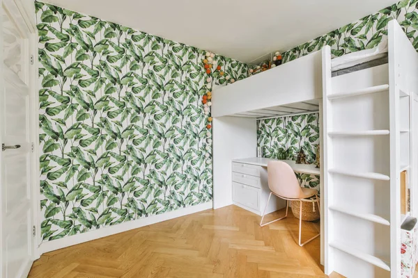 Minimalist interior of study room with parquet floor and white walls furnished with settee and table with shelf rack