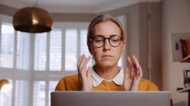 Caucasian female free lance worker working from home