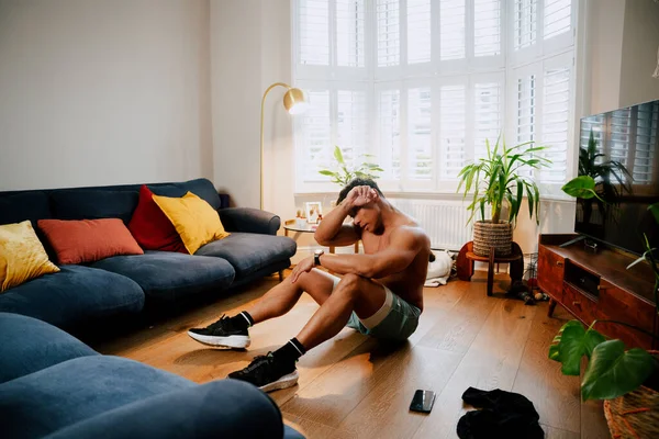 Young Asian male working out indoors — Stockfoto
